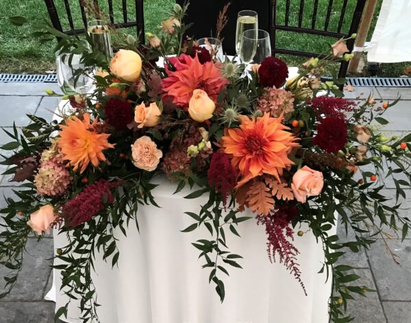 Copper Penny Flowers sweetheart table arrangement